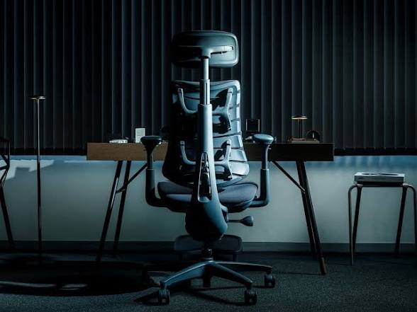 3 Office chairs LiberNovo Omni Dynamic ergonomic chair games gaming professional adjustable headrest footrest head rest foot rest lumber support ultimate lounge gaming relaxing massaging chair