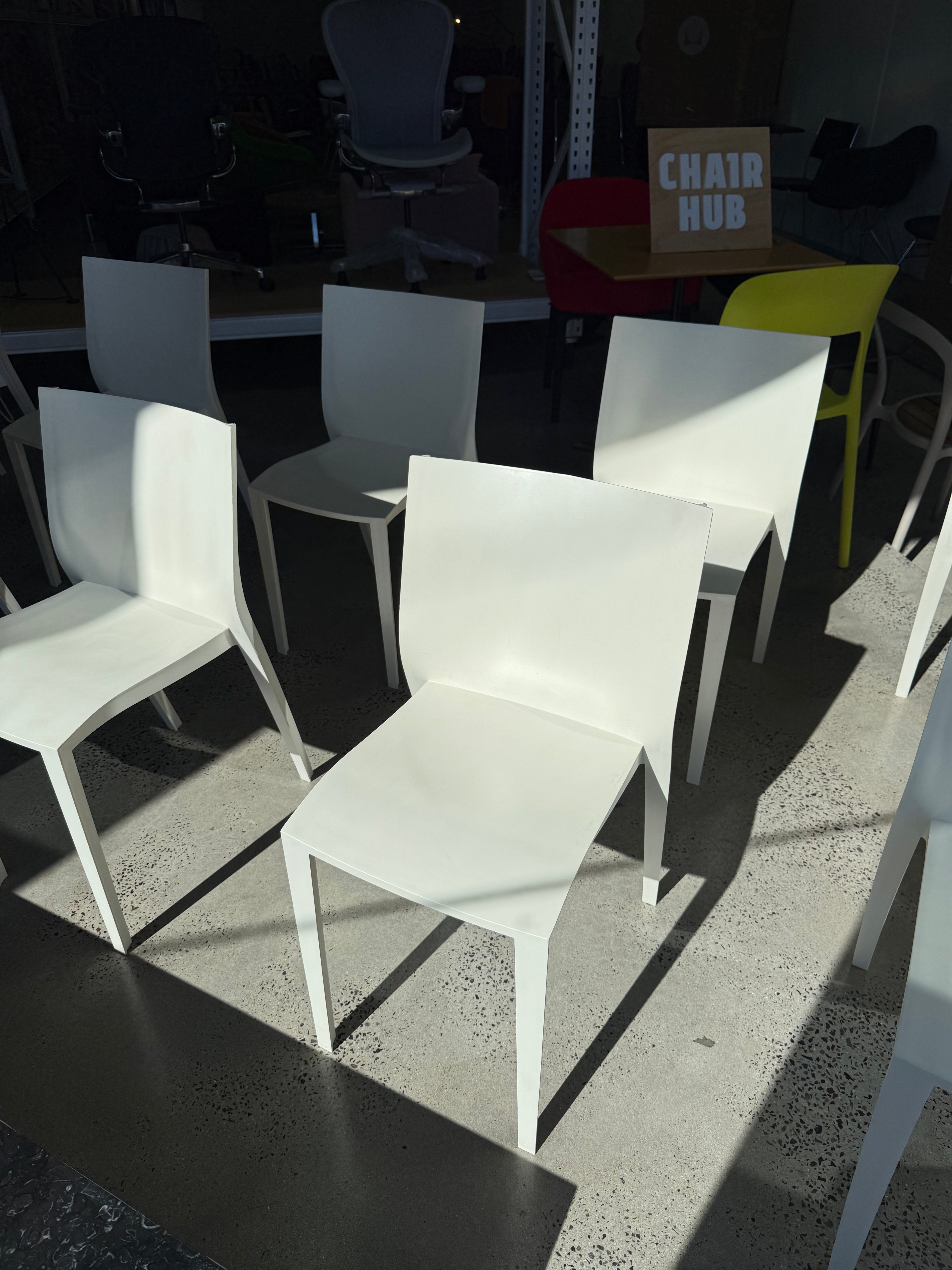 Iconic Philippe Starck Slick Slick Chair Verified Authentic XO 1999 I Made in France Sale at Chairhub Collingwood Fitzroy Sydney Melbourne Premium Authentic Genuine Designer Furniture Art Design Museum Chair Co Smith Street Dining Cafe Hospitality Office Corporate Conference Commercial Grade French Icon Modern Minimal Minimalism Vintage Retro 20th Century Chair Chairs Bulk Wholesale Preowned Sustainable Sustainability Meeting Room Reception Stack Stackable