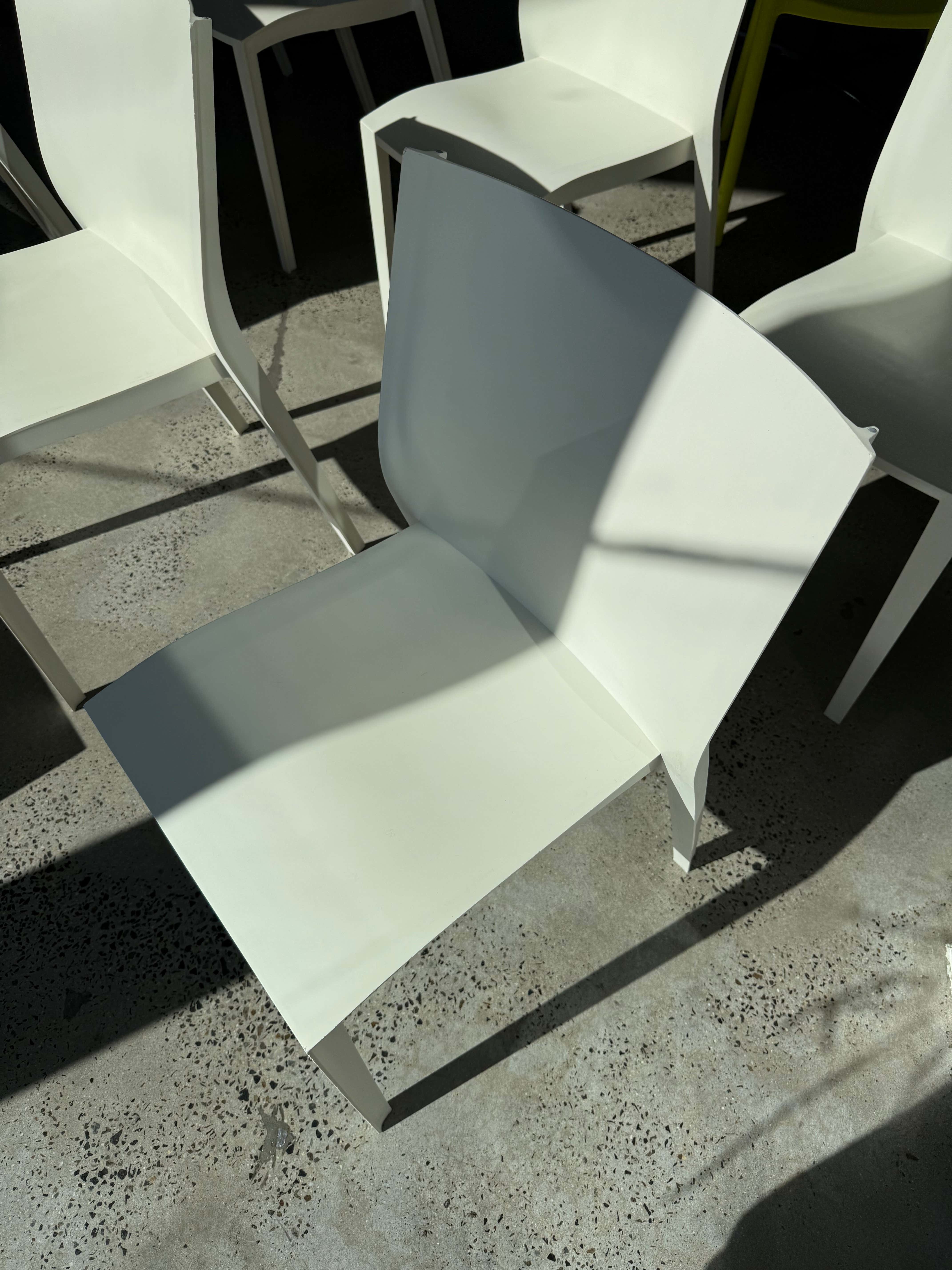 Verified Authentic Philippe Starck Slick Slick Chair Made in France XO 1999 I Premium Authentic Genuine Designer Furniture on Sale at Chairhub Collingwood Fitzroy Stack Stackable Herman Miller Vitra Wilkhahn Kartell Fritz Hansen Sydney Melbourne Art Design Museum Chair Co Dining Cafe Hospitality Office Corporate Conference Commercial Grade French Modern Minimal Minimalism Vintage Retro 20th Century Chair Chairs Bulk Wholesale Preowned Sustainable Sustainability Meeting Room Reception Showroom