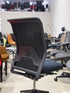 Authentic Vitra ID Mesh ergonomic office chair designed by Antonio Citterio featuring a black breathable mesh backrest, black upholstered seat, commercial-grade construction and premium workplace ergonomics for architects, designers, business owners and office fitout projects throughout Australia. Sydney Melbourne Chairhub Collingwood